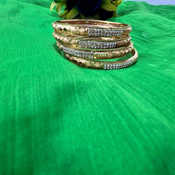 Gold Bangles with Pearl and Stone Work